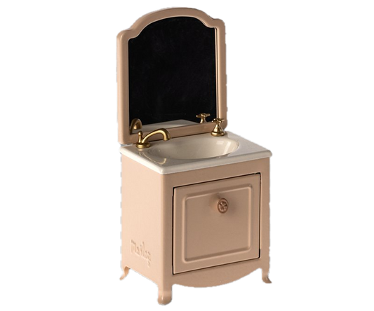 Beige bathroom vanity with mirror and sink on a white background