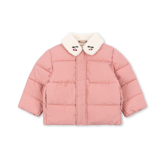 A pink puffer jacket with a white faux-fur collar featuring embroidered cartoon faces, shown against a plain white background.