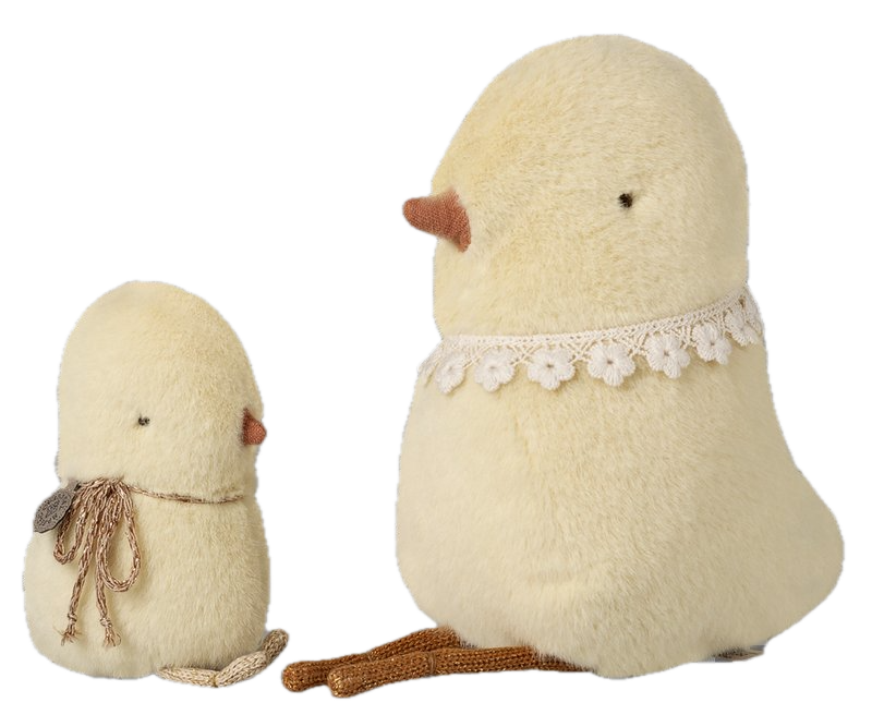 Two fluffy cream-colored chicks with lace details on a white background