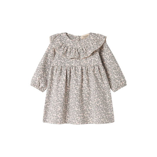 Floral dress with ruffled collar on a white background