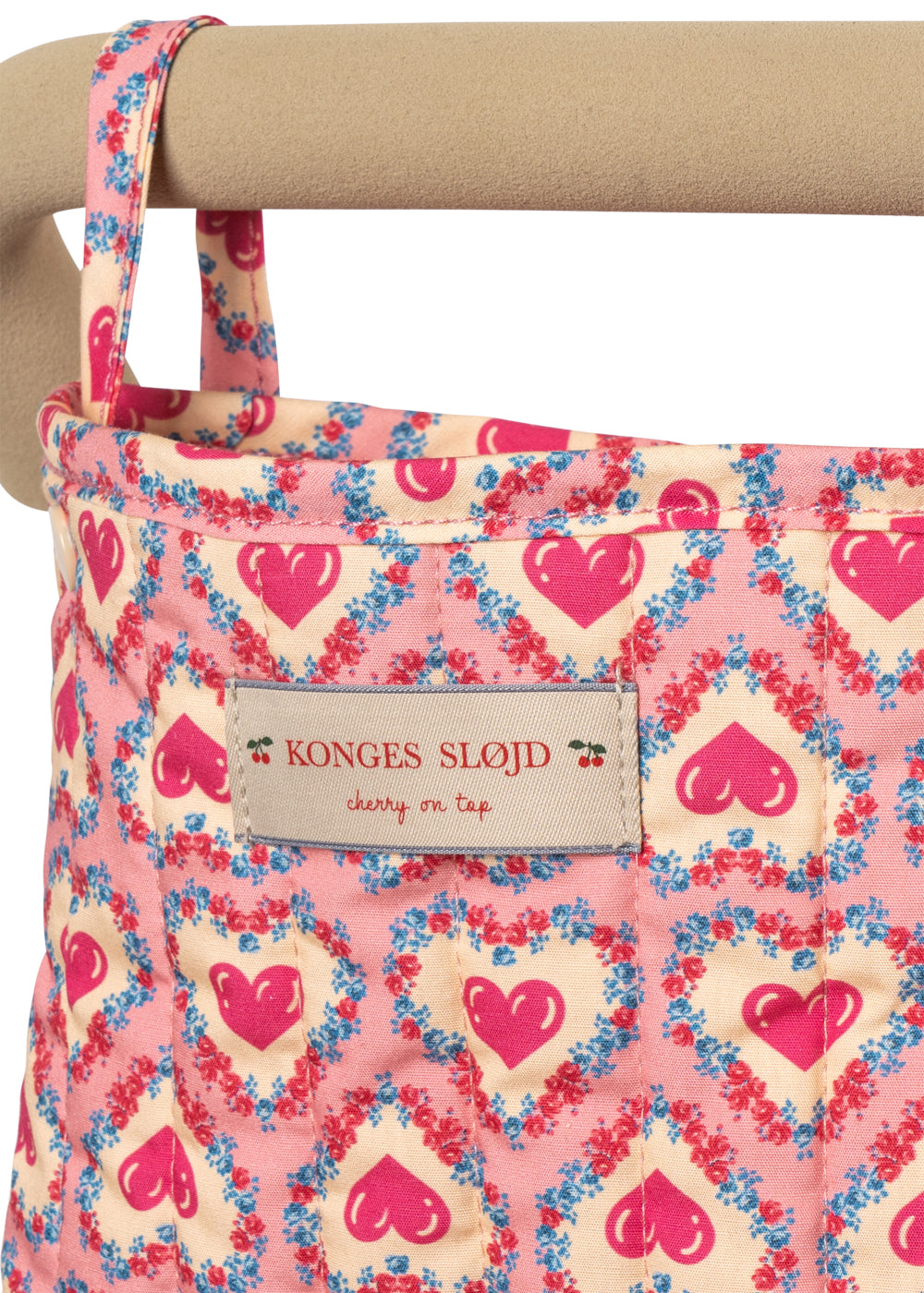 onges Slojd Minnie doll pram in floral print vintage style, close up