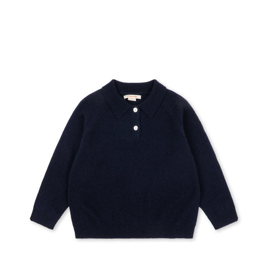 A navy blue long-sleeve knit polo shirt with a three-button placket, laid flat on a white background.