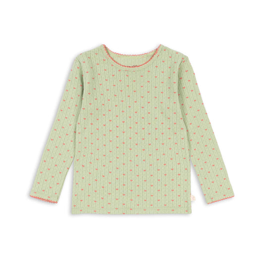 A light green long-sleeve top with a small pink floral pattern and pink trim on the collar and cuffs, displayed flat against a white background.