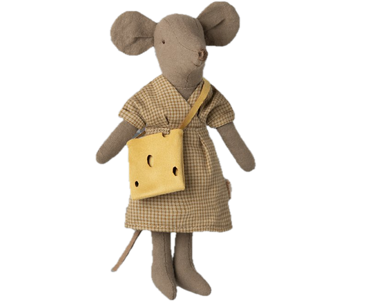 Stuffed mouse toy in a dress with a yellow bag on a black background