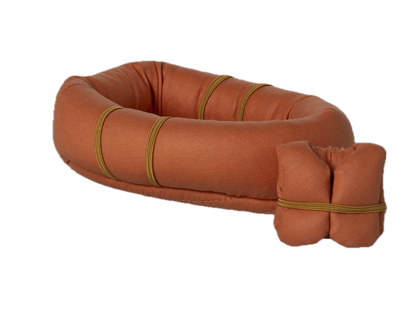 Brown inflatable life buoy with a smaller brown cushion on a white background