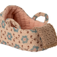 Textile product with floral pattern and textured edge on a white background