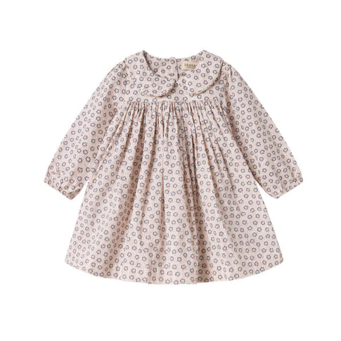 Children's dress with floral pattern on a white background
