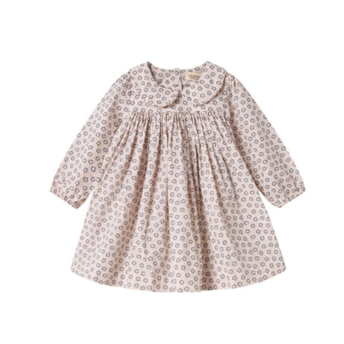 Children's dress with floral pattern on a white background