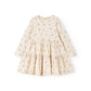 Beige dress with floral pattern on a white background