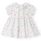 White dress with floral pattern on a white background