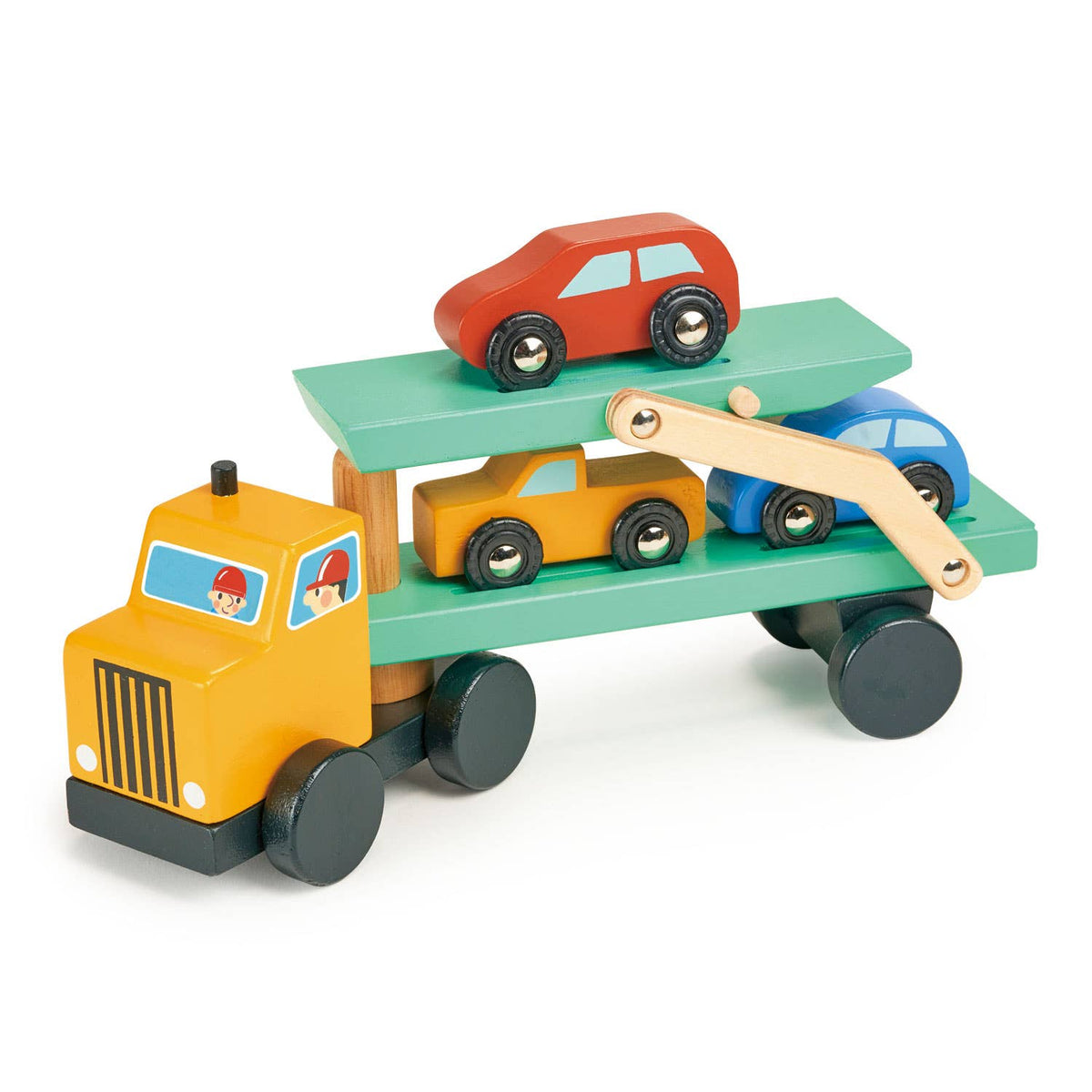 A wooden toy car transporter truck with a yellow cab and green double-decker platform, carrying small toy cars in red, yellow, and blue, photographed on a light off-white background.