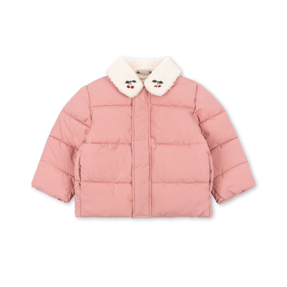 A pink puffer jacket with a white faux-fur collar featuring embroidered cartoon faces, shown against a plain white background.