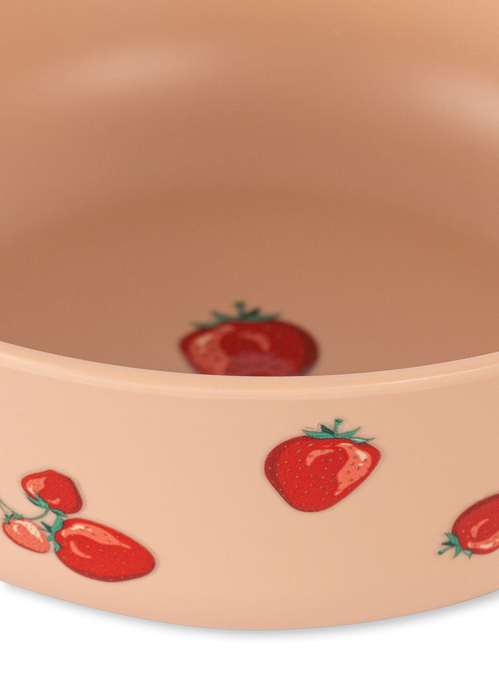 Beige bowl with red strawberry pattern on a beige background