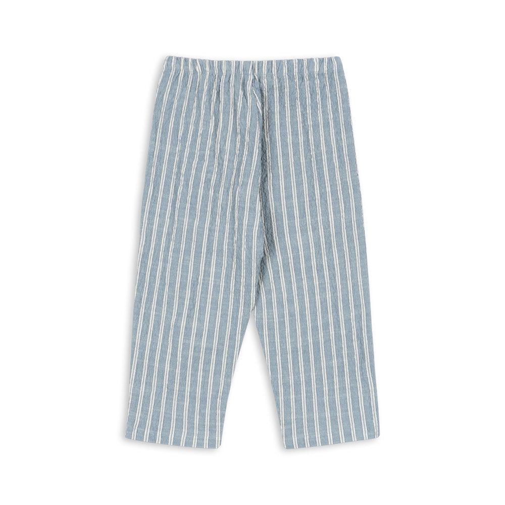 Blue and white striped  organic cotton pants on a white background