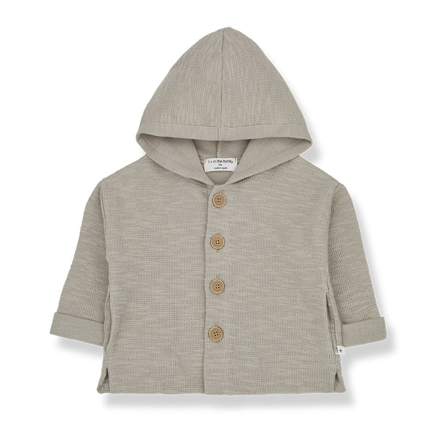 A light summer jacket. With a hood wooden buttons and turn ups on the cuffs.