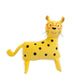 Yellow plush toy with black spots and glasses on a white background