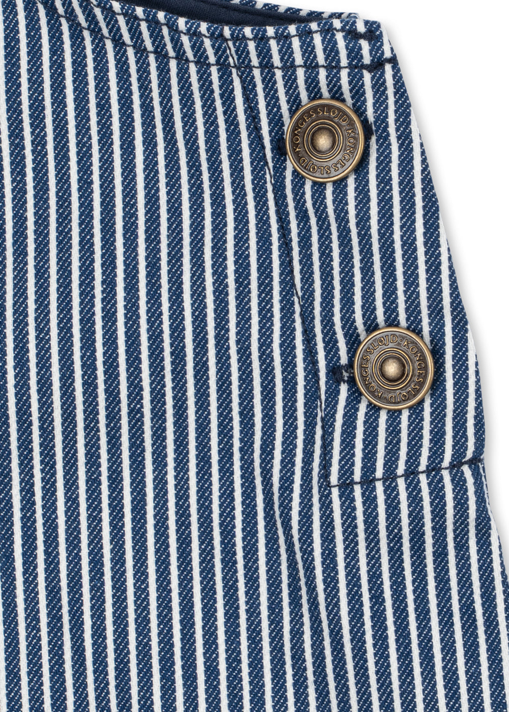 Close-up of a blue and white vertically striped fabric garment with two round bronze buttons, showing the texture of the woven material.