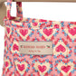 onges Slojd Minnie doll pram in floral print vintage style, close up
