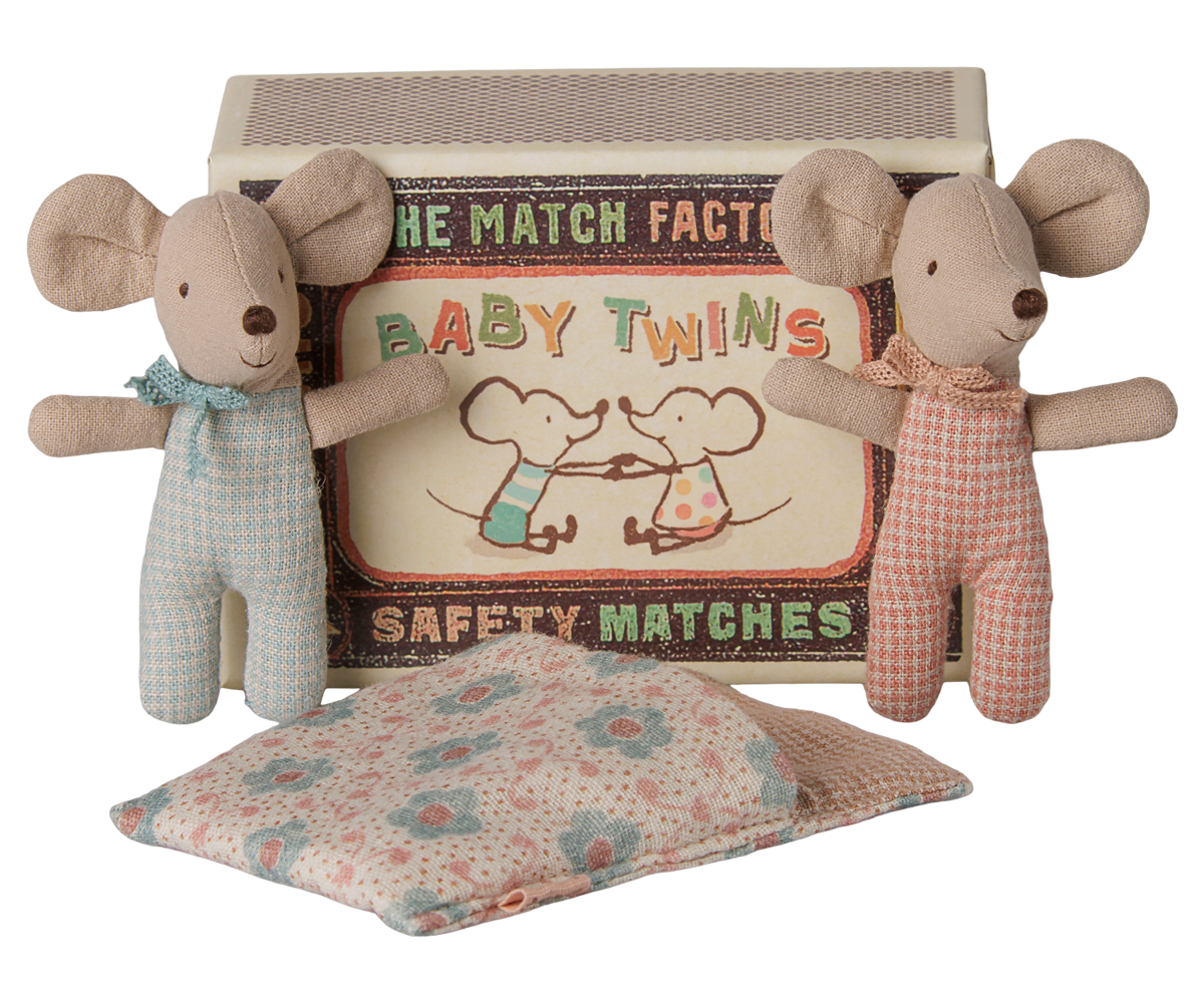 A vintage-style toy set featuring two plush mouse figures standing in front of a box labeled 'Baby Twins Safety Matches,' with a folded floral blanket placed in front on a white background.