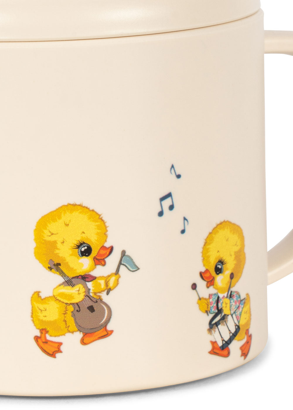 Mug with yellow duck illustrations playing instruments on a white background