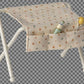 Small white stool with a polka dot cushion and toys on a transparent background