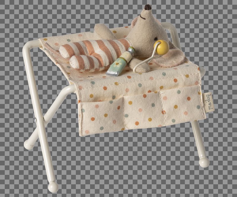 Baby changing table with toys on a transparent background