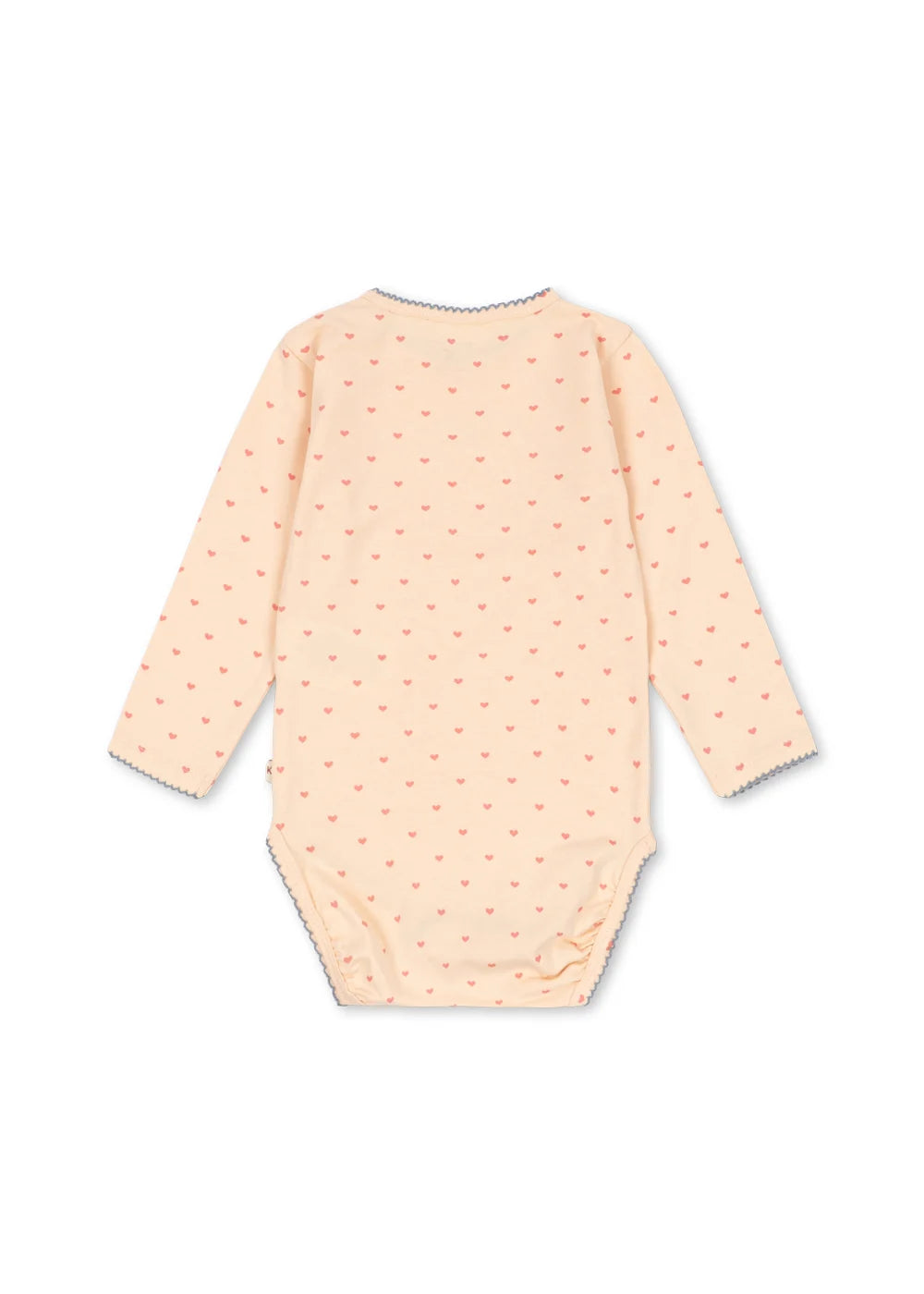 A long-sleeve baby bodysuit shown from the back, featuring a light peach base with a small orange polka dot pattern and gray scalloped trim along the neckline and cuffs.