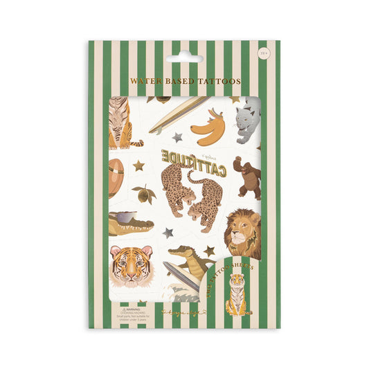 Pack of water-based tattoos with animal designs on a green and white striped background