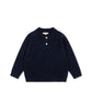 A navy blue long-sleeve knit polo shirt with a three-button placket, laid flat on a white background.