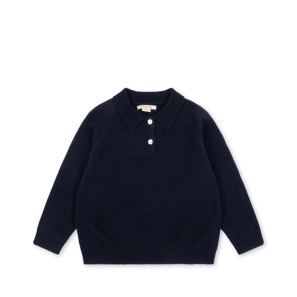 A navy blue long-sleeve knit polo shirt with a three-button placket, laid flat on a white background.