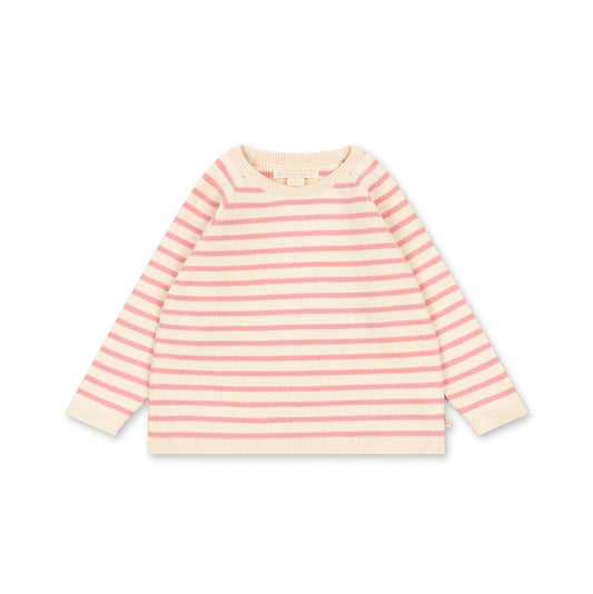 A long-sleeve children's top with horizontal stripes in pale pink and cream, laid flat against a white background.