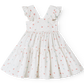 White dress with floral pattern on a white background