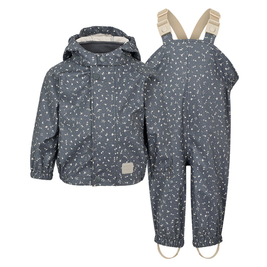 Children's raincoat and pants set with a floral pattern on a white background