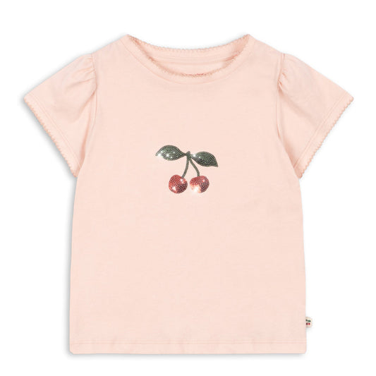 Pink t-shirt with cherry design on a white background