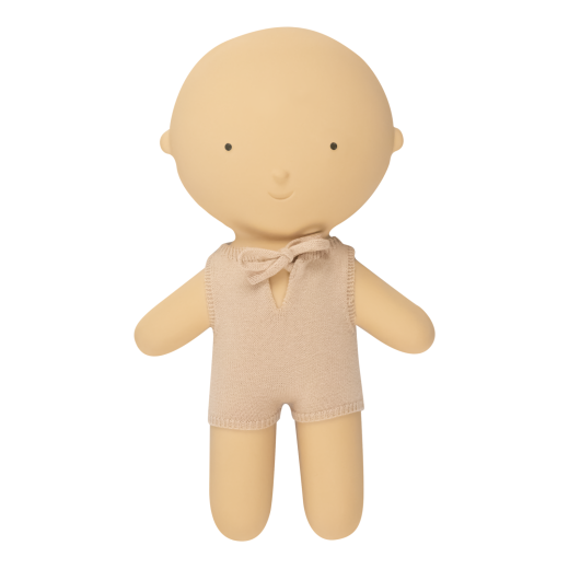 Beige baby doll with a plain background