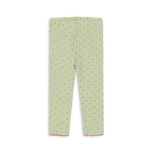 Light green children's leggings with a vertical striped pattern and small red accents, shown flat against a white background.