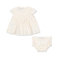 White organic cotton Summer baby dress and bloomers set on a white background a lovely gift