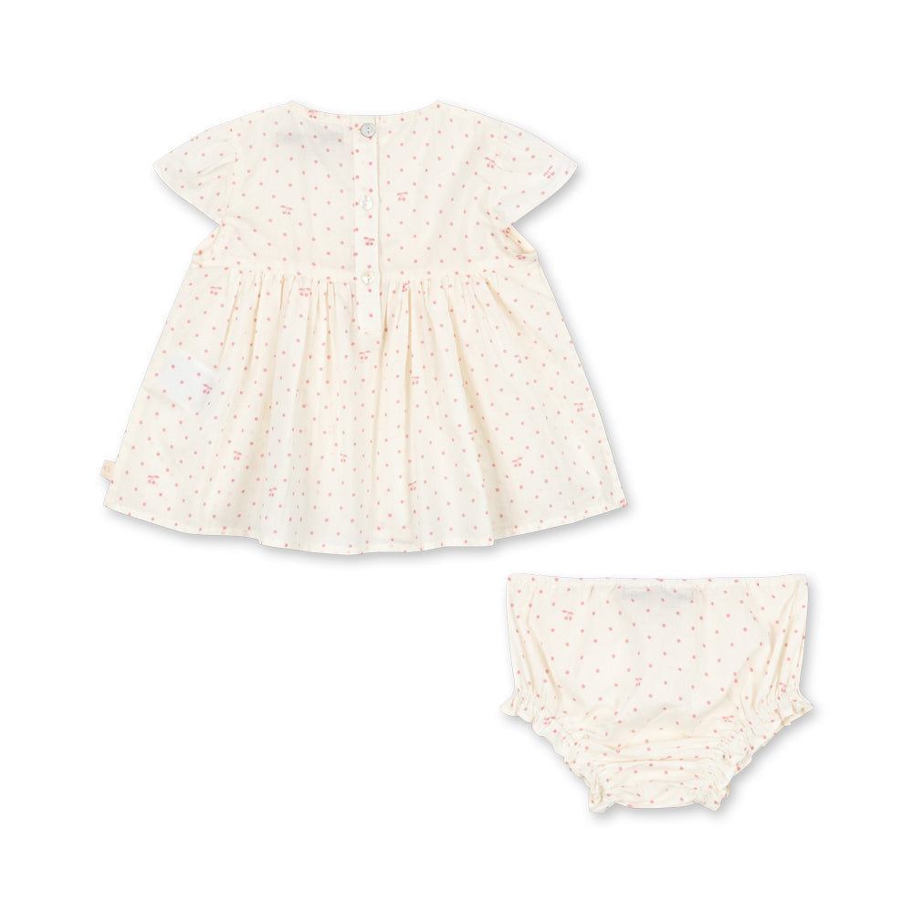 White organic cotton Summer baby dress and bloomers set on a white background a lovely gift