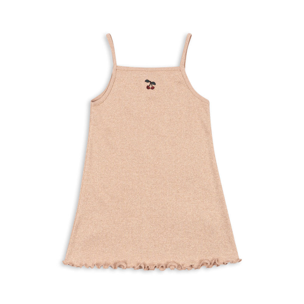 Beige dress with thin straps on a white background