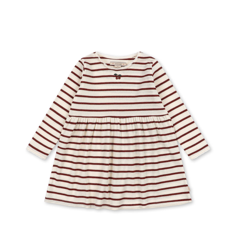 A long-sleeve baby dress with horizontal rust red and cream stripes, featuring a gathered waist and a small bow at the neckline, shown on a plain white background.