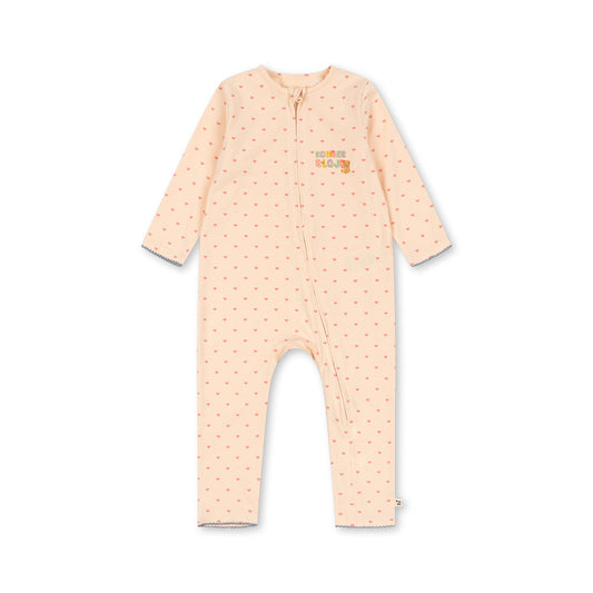 A baby long-sleeve footless one-piece jumpsuit in a pale peach-pink color with a small repeating orange pattern and a small 'the little bear' logo on the left chest, displayed flat against a white background.