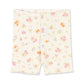 Floral patterned shorts on a white background