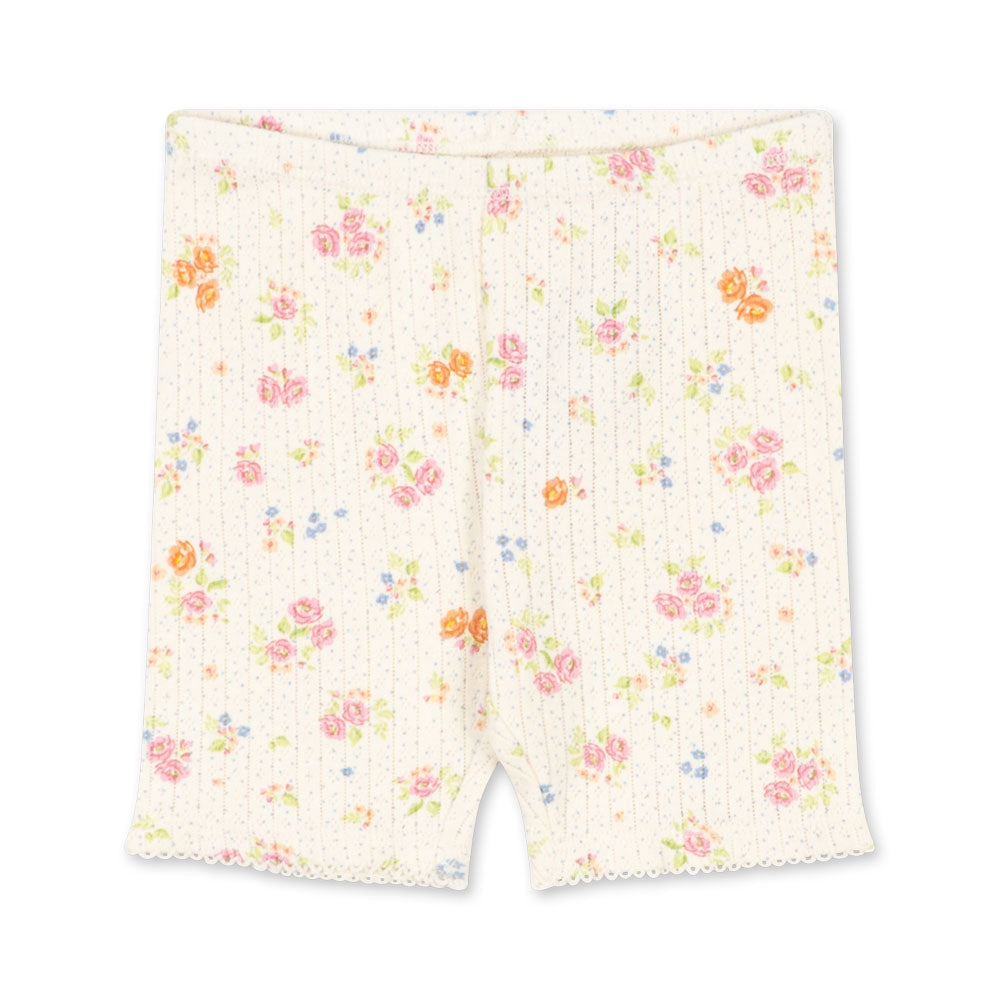 Floral patterned shorts on a white background
