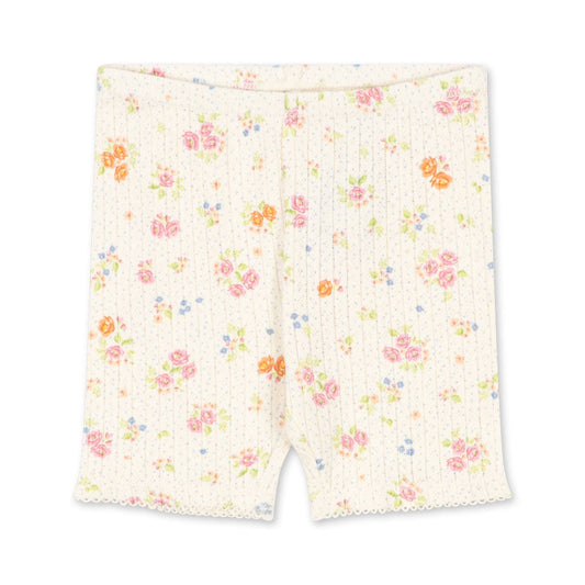 Floral patterned shorts on a white background