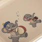 Two cartoon elephants playing music on a beige background