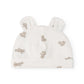 An off-white knit baby hat with small ear tufts and an allover print of teddy bears in a muted brownish-gray color, shown against a plain white background.