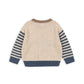 Beige sweater with blue striped sleeves on a white background