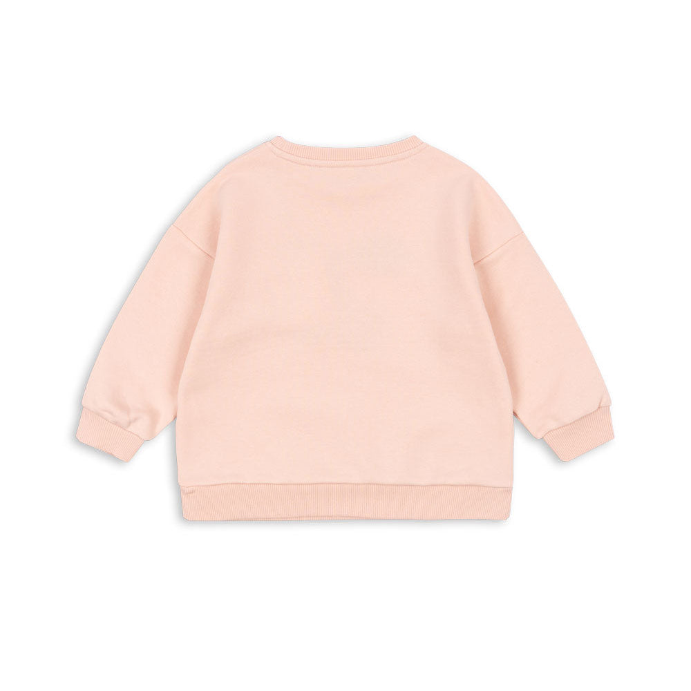 Back view of peach kids sweatshirt in soft cotton fabric