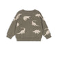 Children's sweater with dinosaur pattern on a white background