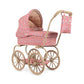Close-up of floral fabric and scalloped edge on doll pram